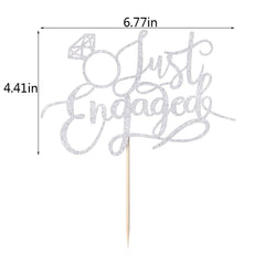 Sodasos engaged ring sign enhances the centerpiece with elegant shimmer.