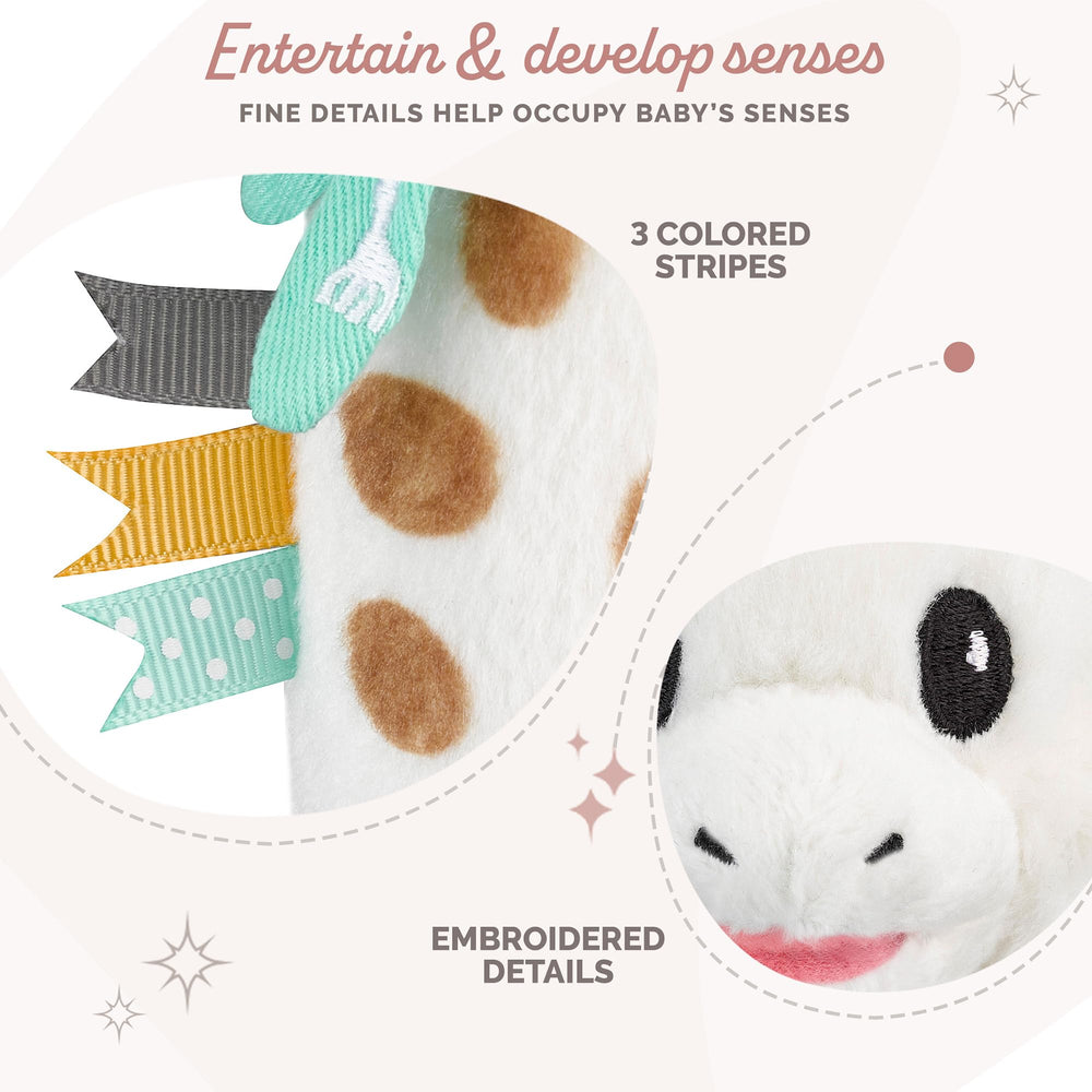 Sophie la girafe Sweetie Pouet Rattle body squeeze close-up, soft touch for easy grasp