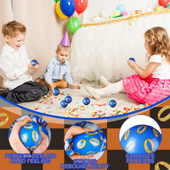 Soulchen blue and golden rings stress ball in hands for focus.