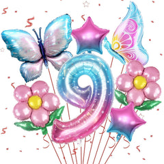 Sowide butterfly balloons with giant number 9 centerpiece for birthday photos.
