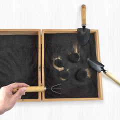 SPACECARE zen garden tools included for hands on exploration.