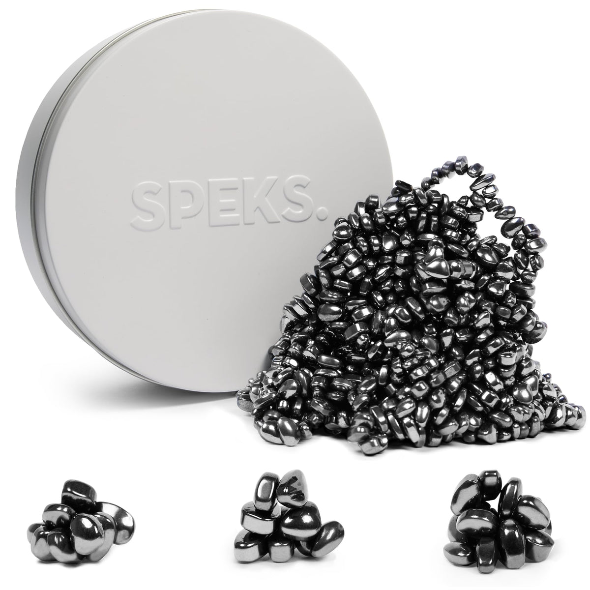 Speks Crags ferrite putty with ferrite stones in a tin for quiet desk relief.