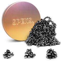 Speks Crags ferrite stones in a tin for tactile stress relief and focus.