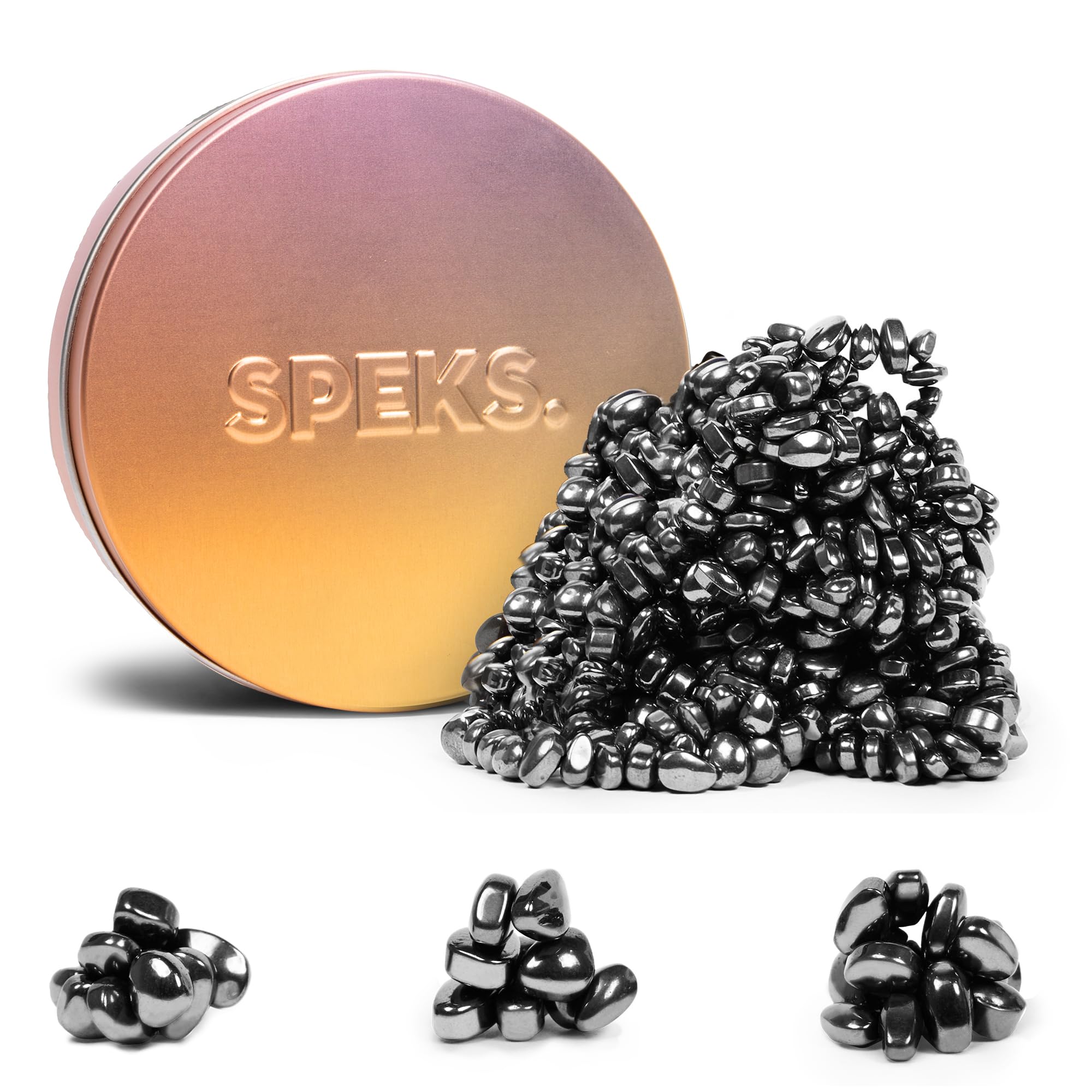 Speks Crags pink gradient tin with ferrite stones for tactile focus during work.