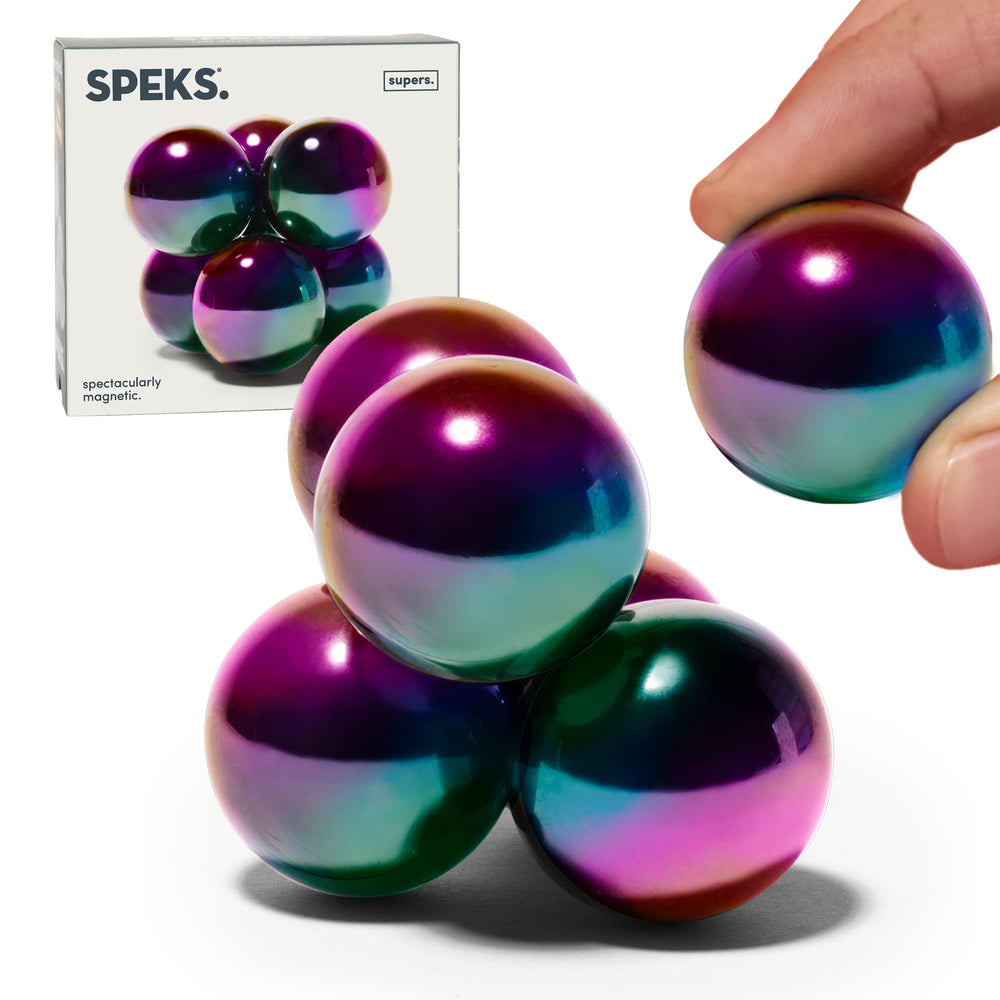 Speks Supers magnetic balls on a clean desk, ideal for focused fidgeting.