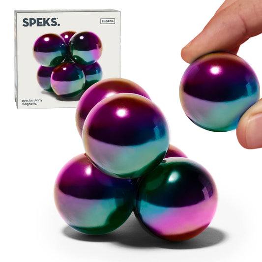 Speks Supers magnetic balls on a clean desk, ideal for focused fidgeting.