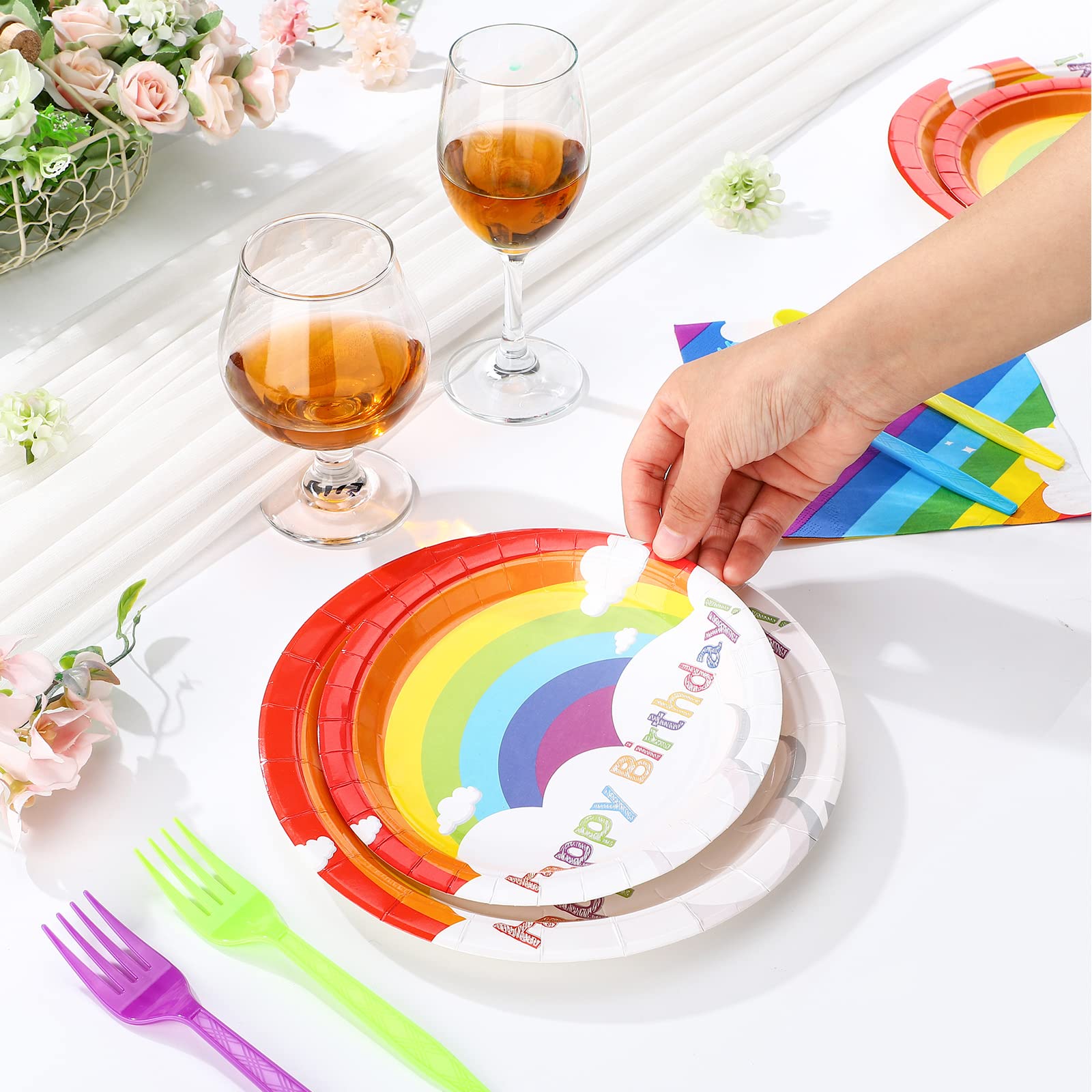 Spiareal rainbow party decorations set the tone for celebrations.
