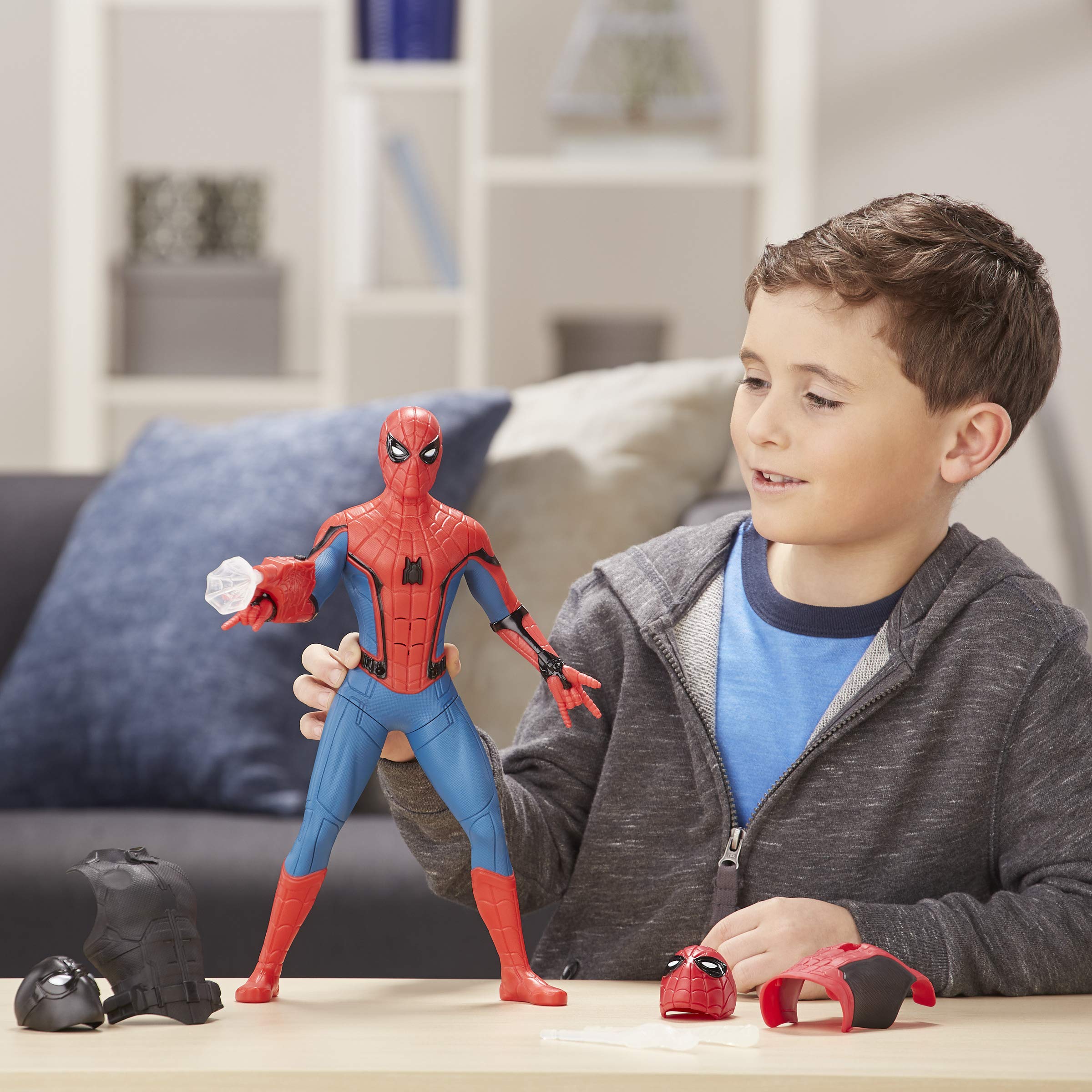 Spider-Man Far From Home Web Gear figure includes extra masks and chest pieces for suit upgrades.