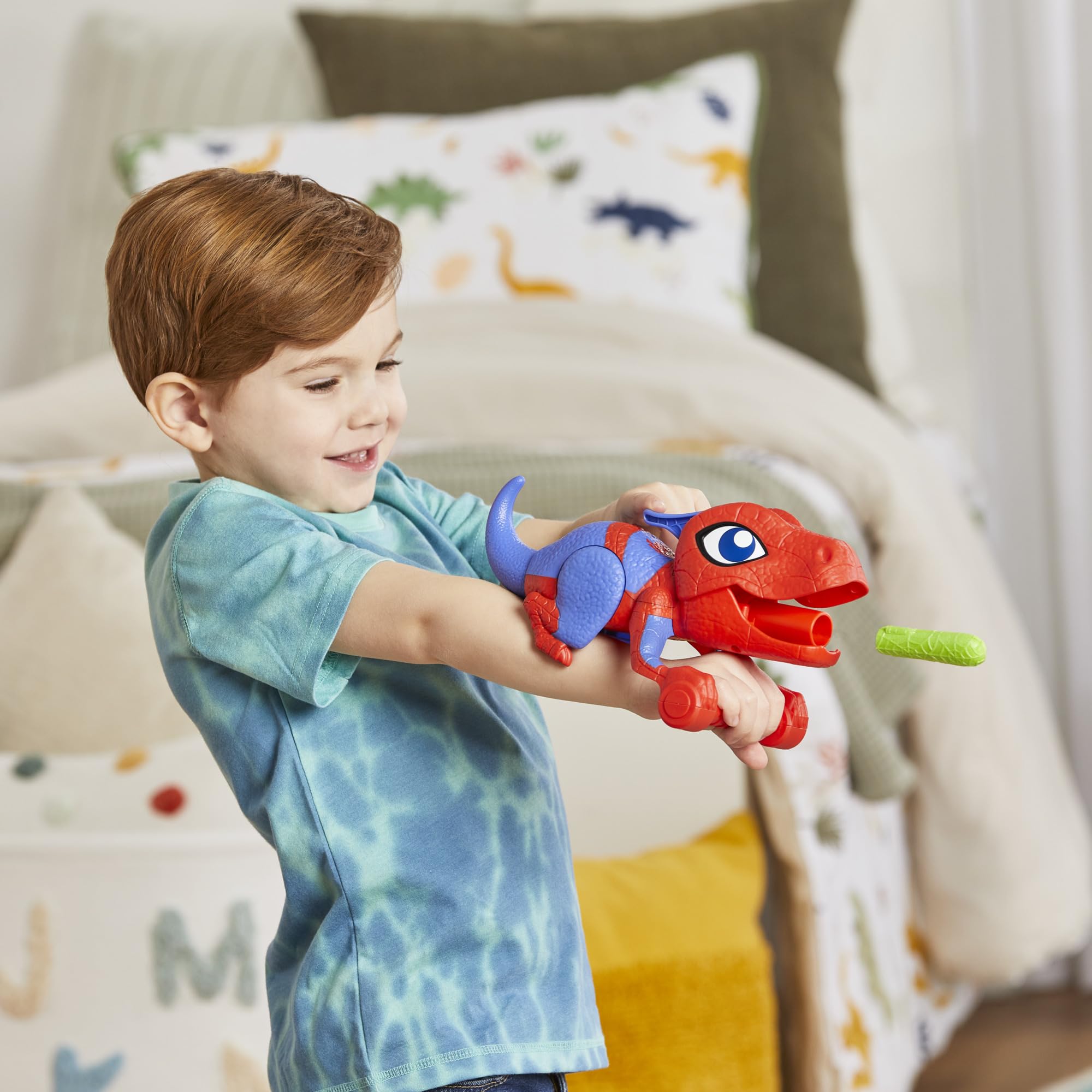Spidey and His Amazing Friends Spidey-Rex launcher for right- or left-handed play.