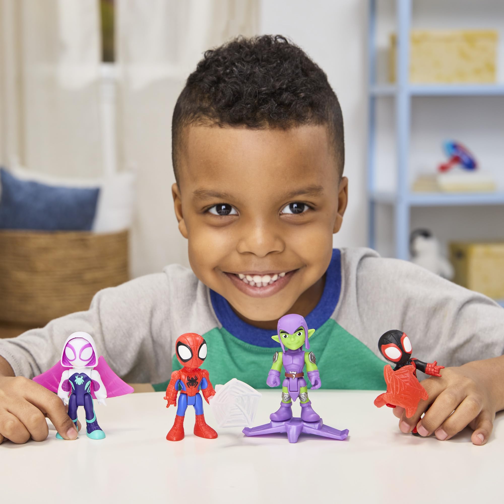 Miles Spin Morales figure held in hand, ideal for tactile storytelling and pretend play.