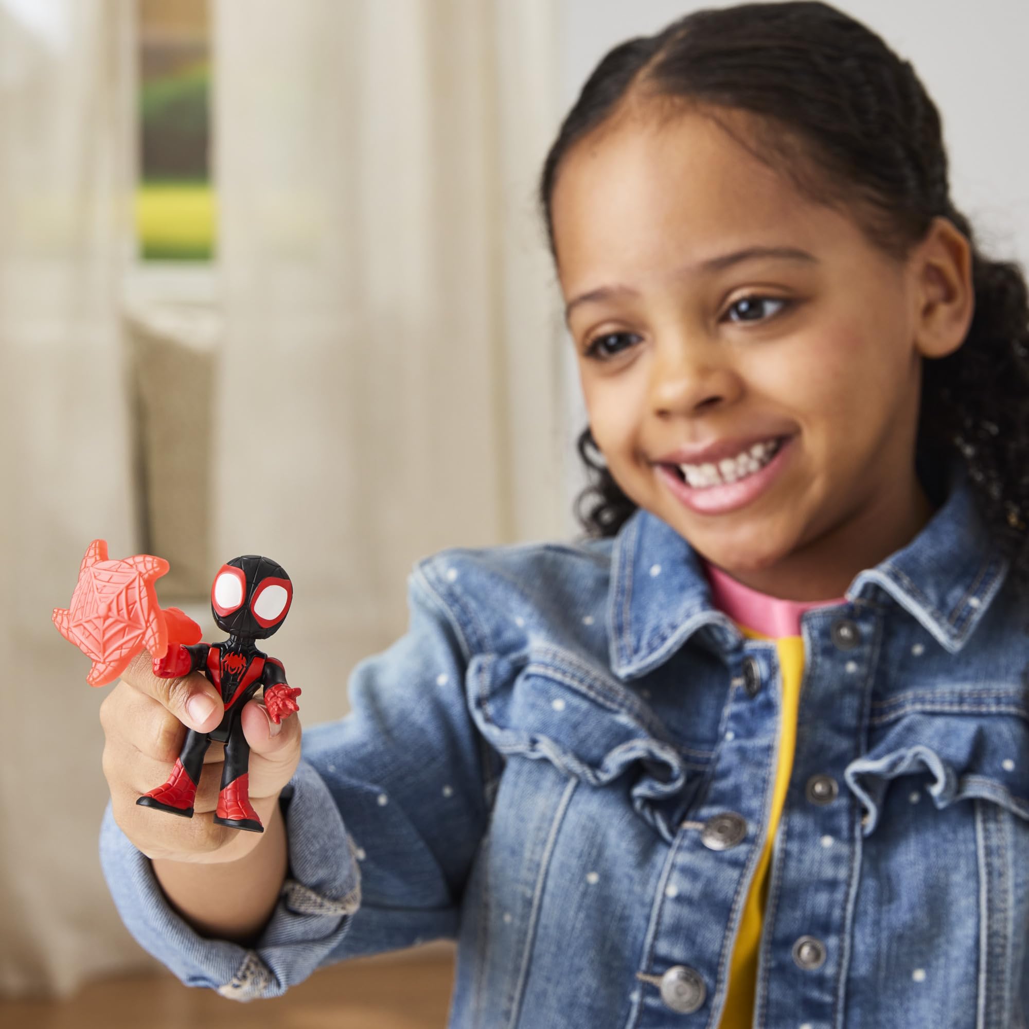 Removable mesh accessory shown with Miles Spin Morales for creative web-slinging play.