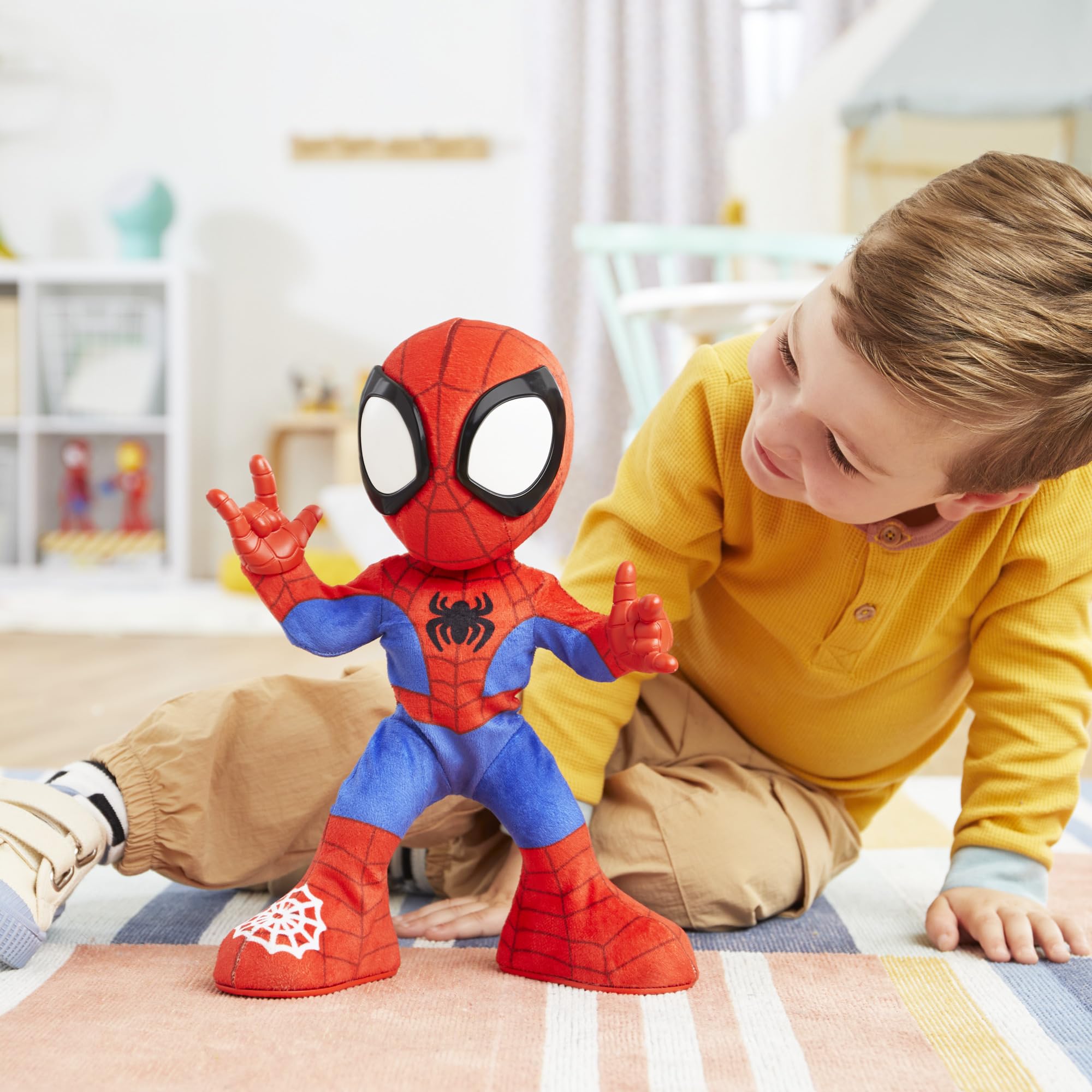 Spidey belly crawl position helps kids imitate the crawl action.