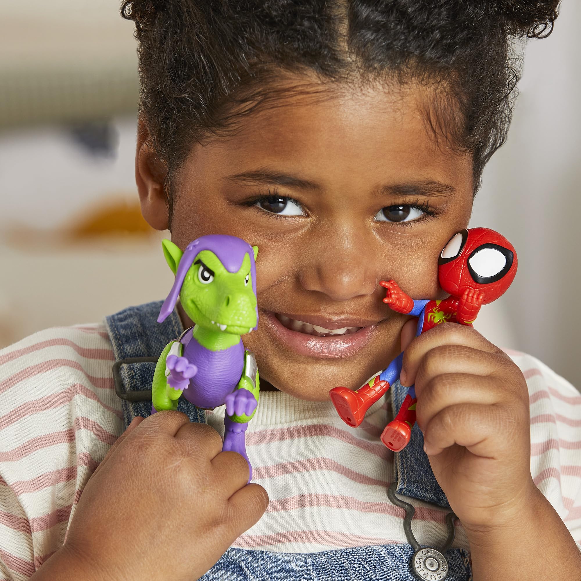 Dino adventure scene featuring Spidey and the Goblin Raptor in action.