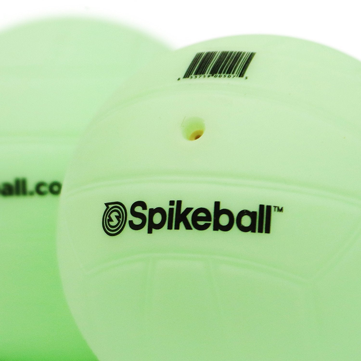 Spikeball Glow-in-the-Dark Balls illuminated for nighttime practice