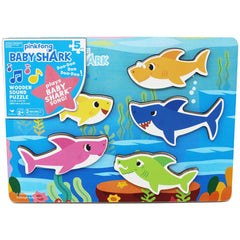 Spin Master Baby Shark musical wooden puzzle with five pieces for shape recognition.