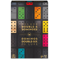 Spin Master family game night setup featuring dominoes and wooden case.