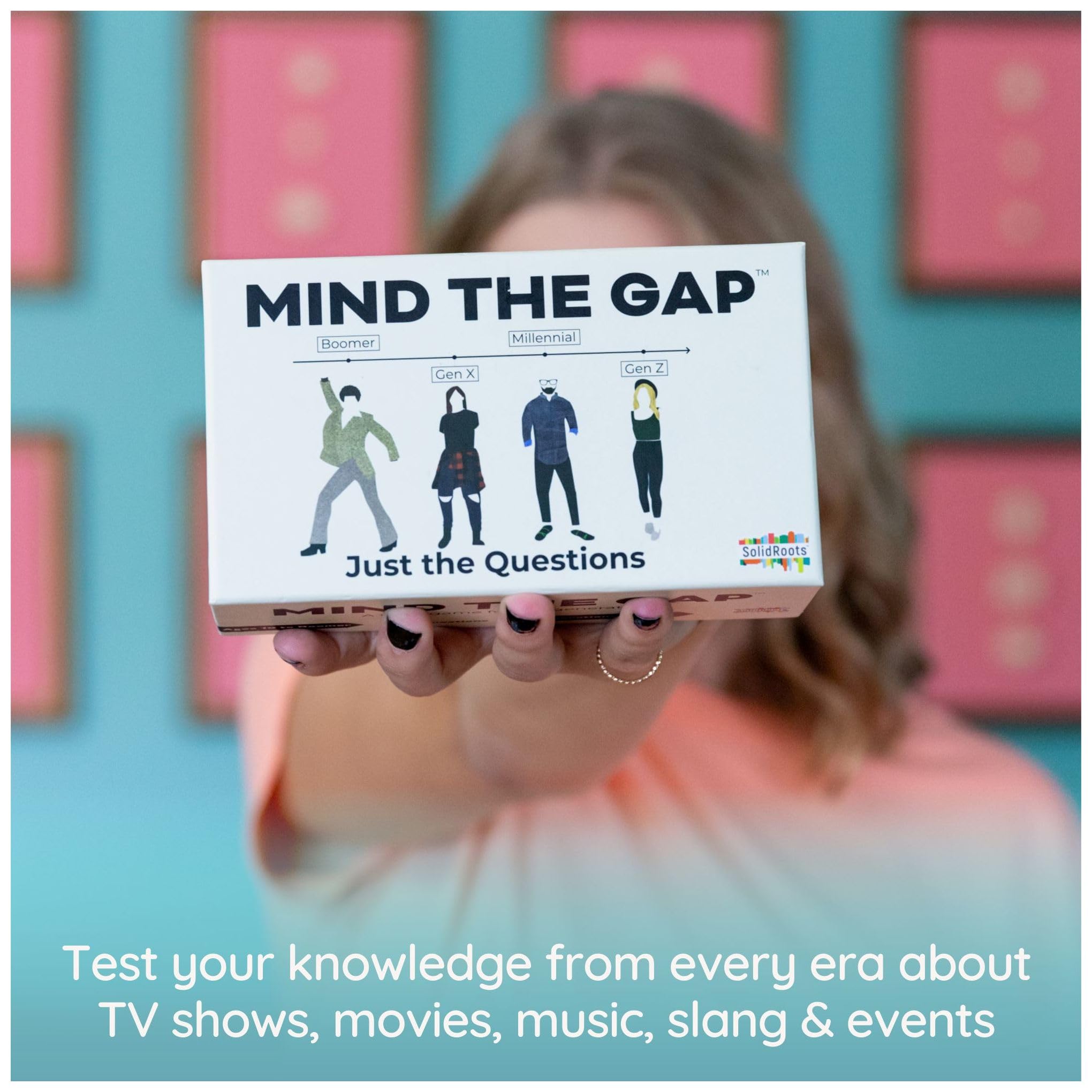 Spin Master Mind the Gap Just the Questions question card close-up shows vivid prompts.