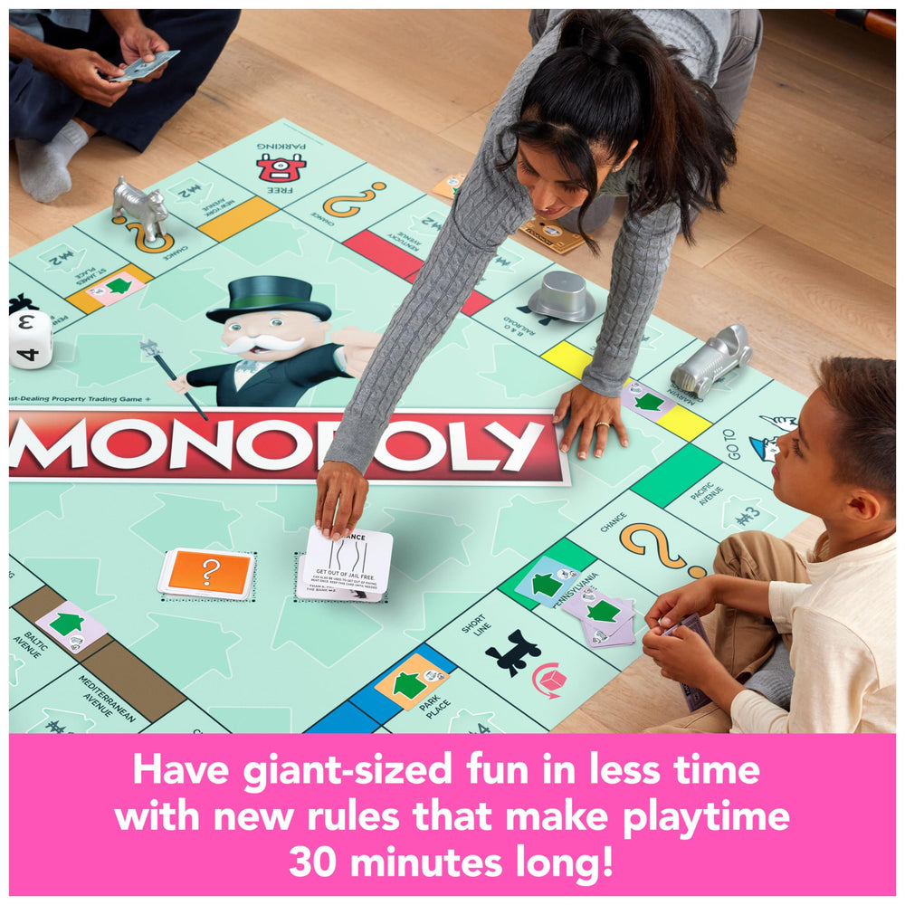 Oversized tokens from Monopoly Giant Edition boost visibility and engagement during rounds.