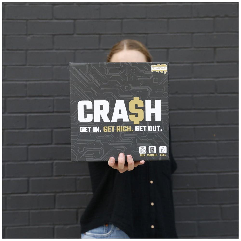Spin Master Games SolidRoots Crash packaging highlights family game night appeal.