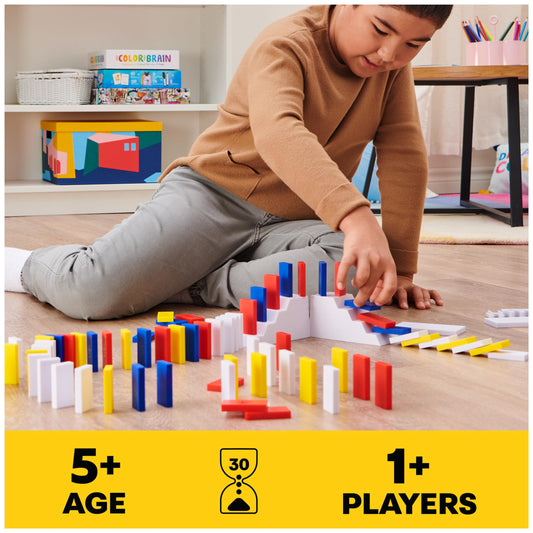Accessories and templates help design repeatable chain reactions in domino art.