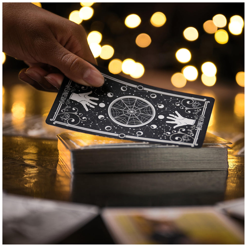 Spin Master Wednesday black and white cards emphasize the core challenge.