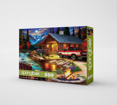 Springbok Cabin on the Creek: red pickup truck and rustic charm for nostalgic puzzle vibes.