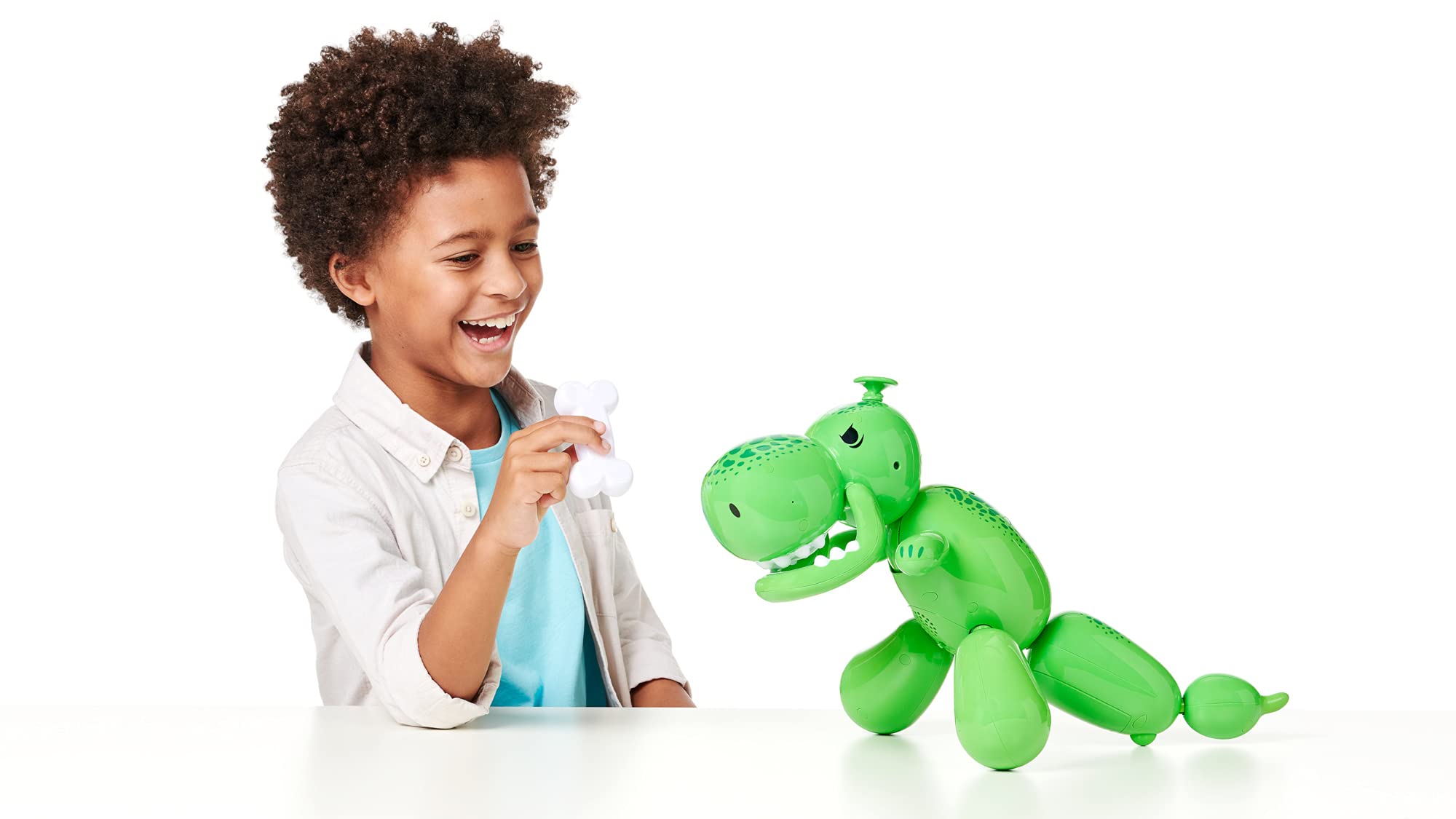 Squeakee Dino in Chicken game setup invites interactive challenges.