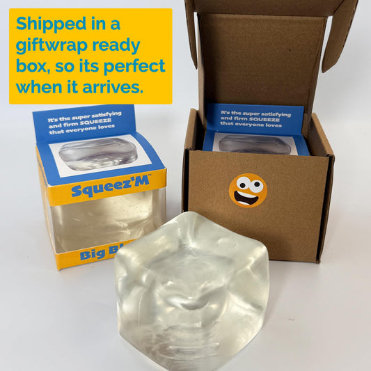 Squeez'M Gift-ready packaging showcases durable sensory cube for stress relief and play.