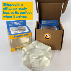 Squeez'M Gift-ready packaging showcases durable sensory cube for stress relief and play.