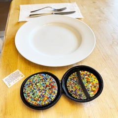 Non-sticky silicone texture of Squeez'M Skin Picking Pad for safe sensory exploration and cleaning.