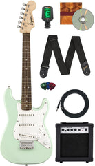 Squier Mini Strat Surf Green bundle with amp, ideal for beginner practice.