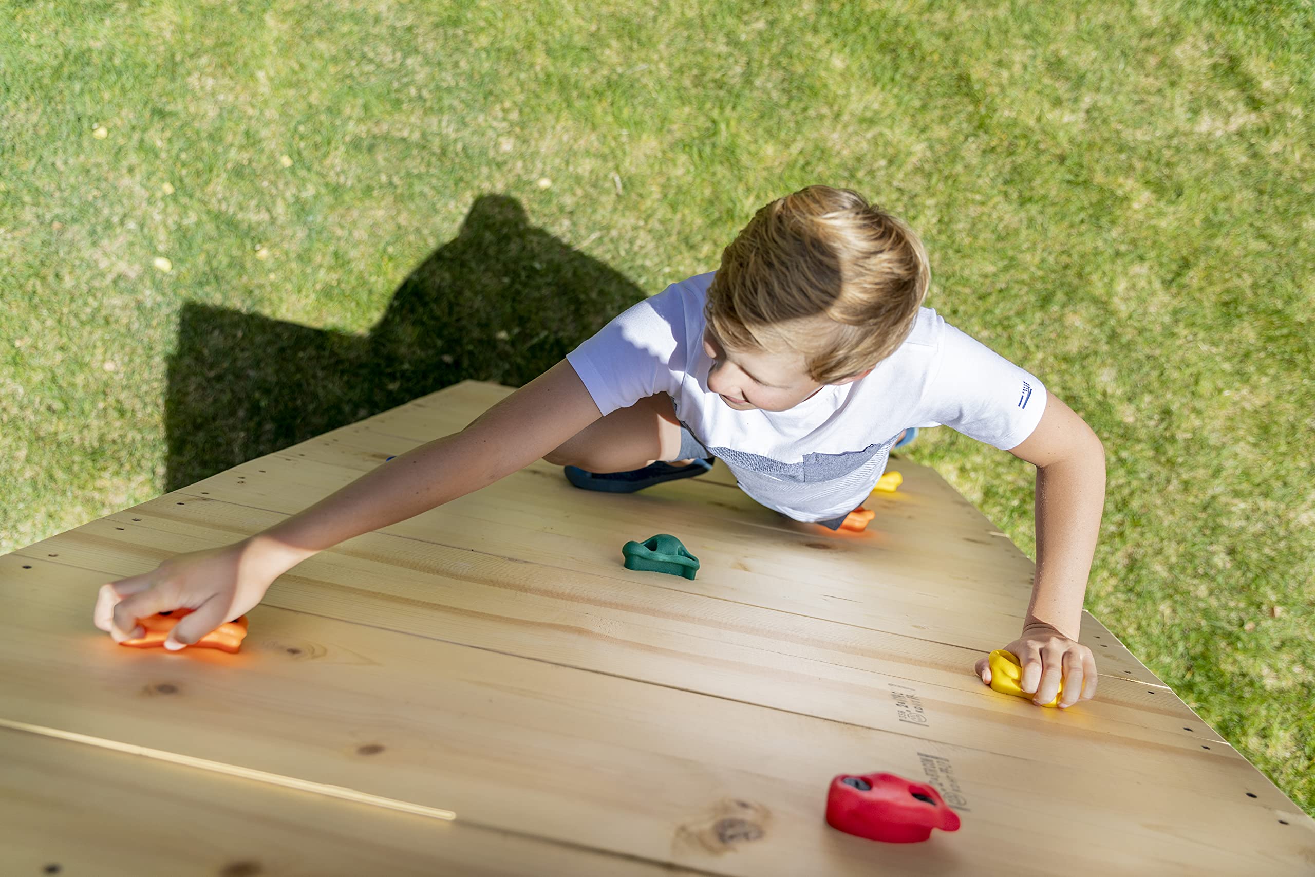 Squirrel Products backyard rock wall setup designed for kids age 3 and up.