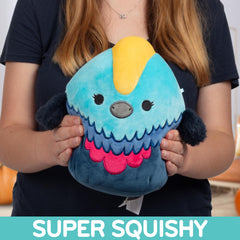 Squishmallows Melrose Cassowary in hand, perfect travel buddy on car rides.