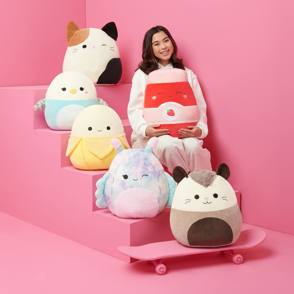 Official Squishmallows seal on Samir blue whale plush.