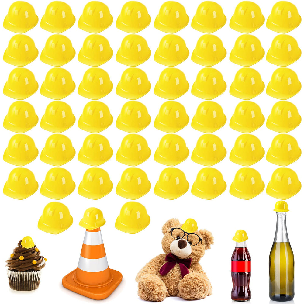 Sratte yellow miniature construction hats as bottle toppers for festive decor