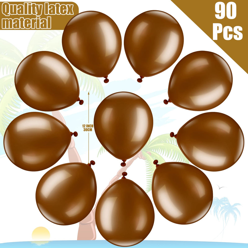 Sratte tropical party setup featuring palm leaves and coconuts balloons