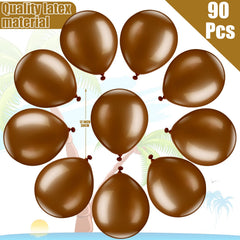 Sratte tropical party setup featuring palm leaves and coconuts balloons