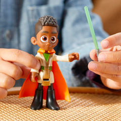 Removable cape enhances Kai Brightstar's costume-based play.