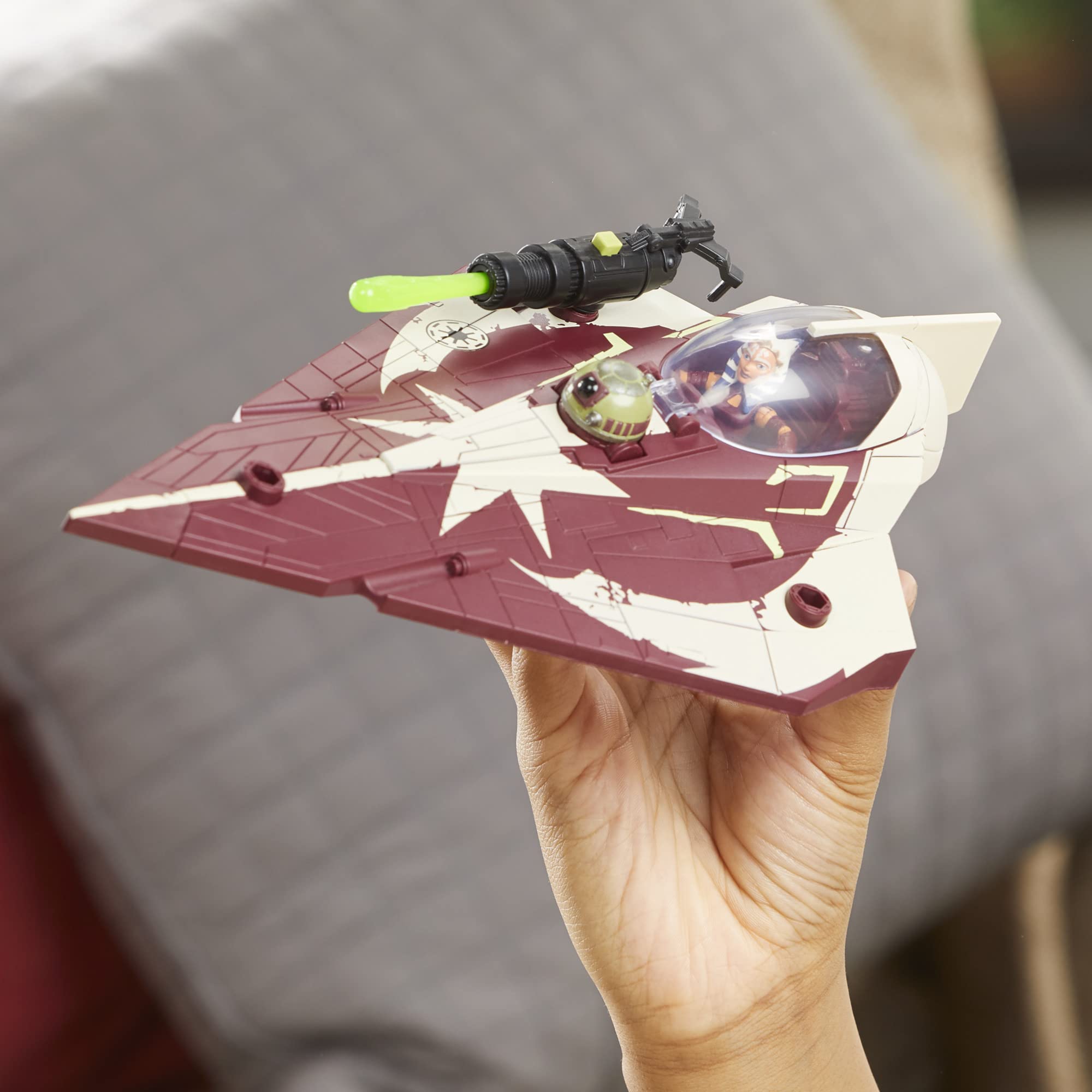 Star Wars Mission Fleet: Delta-7 Jedi Starfighter in action pose.
