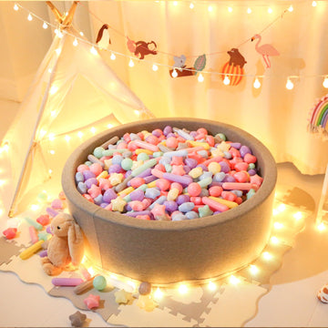 STARBOLO balls in water pool provide splash-friendly sensory fun.