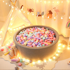 STARBOLO balls in water pool provide splash-friendly sensory fun.