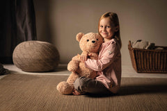 Steiff Jimmy Teddy Bear with ultra-soft fur invites gentle cuddles and hugs.
