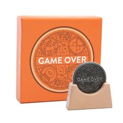 Stellar Factory Game Over Coin close-up showing its 1.5 inch size.