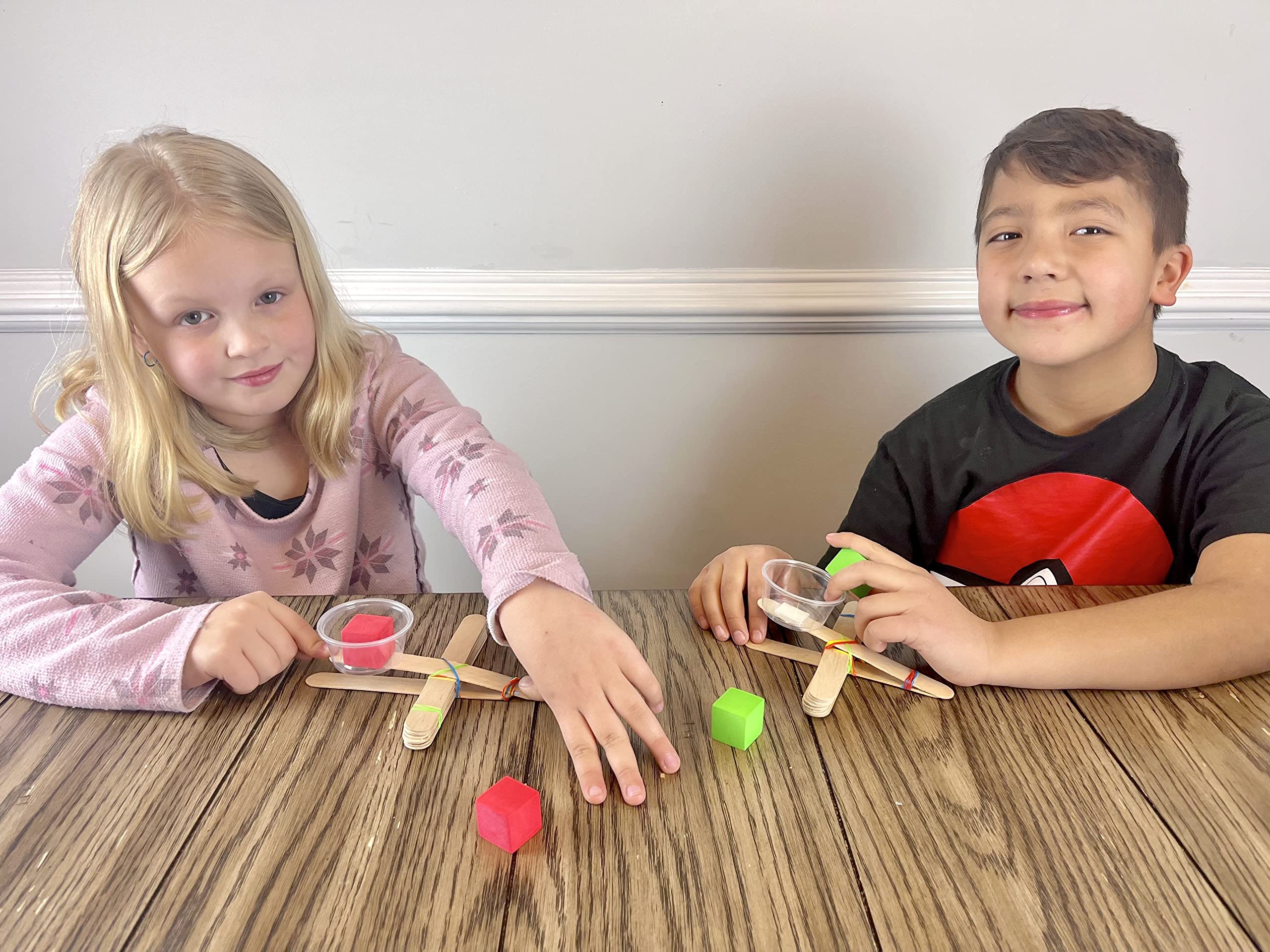 STEM Inventions Catapult Kit launch trajectory demo supports energy learning.