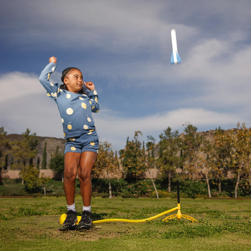 Stomp Rocket Jr Glow outdoor play setup for imaginative STEM fun.