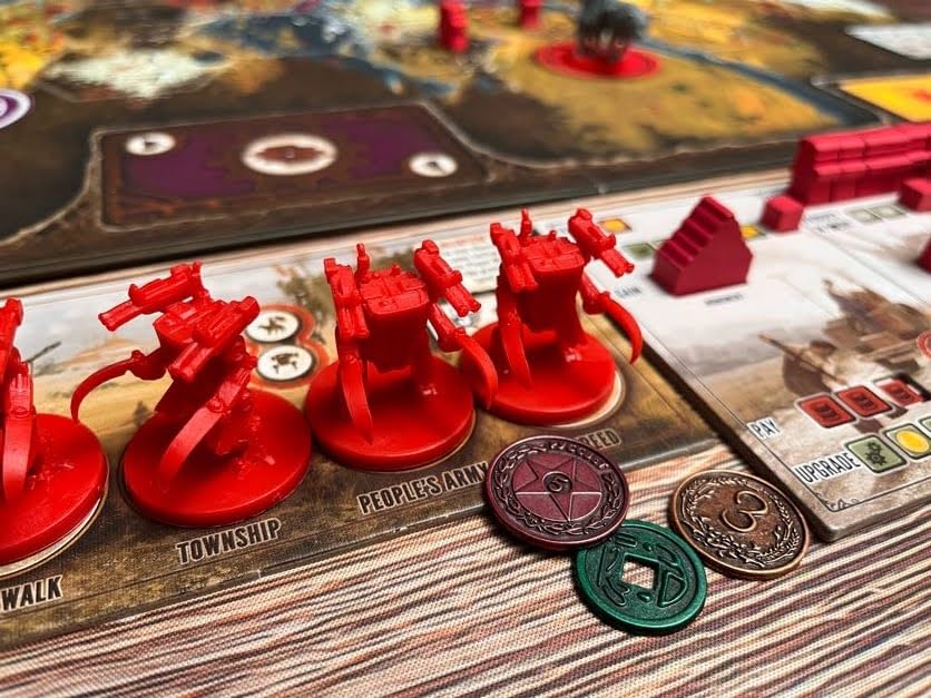 Stonemaier metal coins feature two-sided designs for Scythe.
