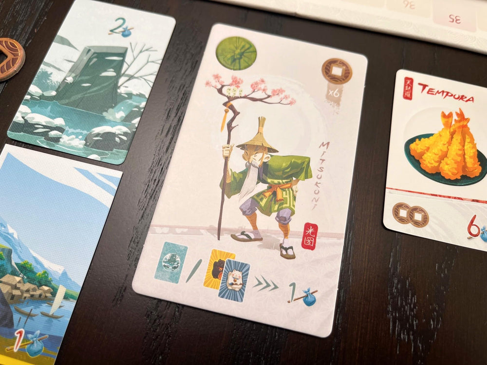 Stonemaier Tokaido souvenirs cards scene showcases collectible rewards during play