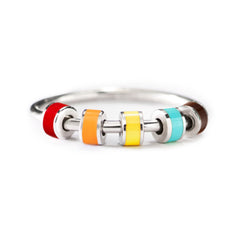 StoryJewellery fidget ring closeup with enamel detail for discreet calm