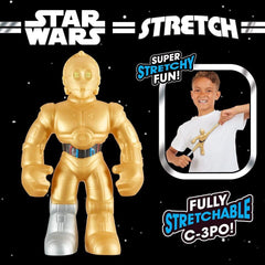STRETCH ARMSTRONG C-3PO with kid demonstrates easy grip and storytelling.