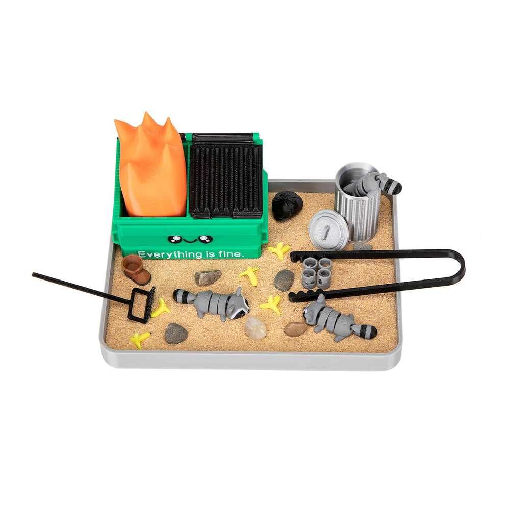 Stylor Dumpster Fire Zen Garden tray with a playful raccoon for desk decor and quick stress relief.